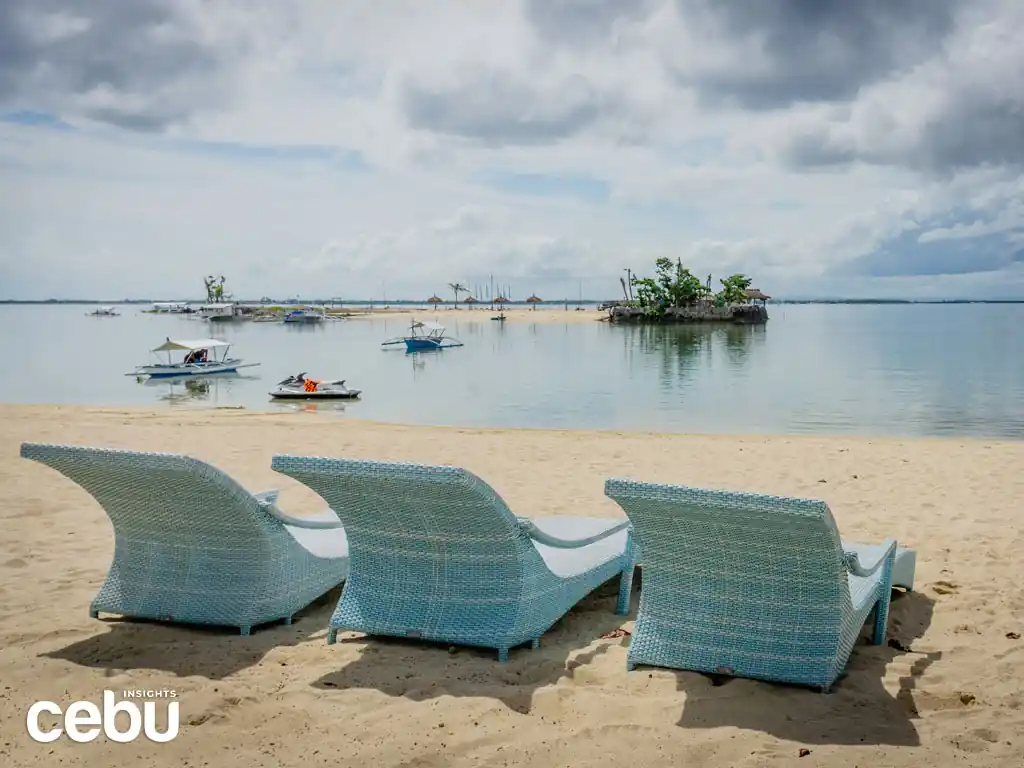 Tanning beds facing the sea at Cebu White Sands Resort