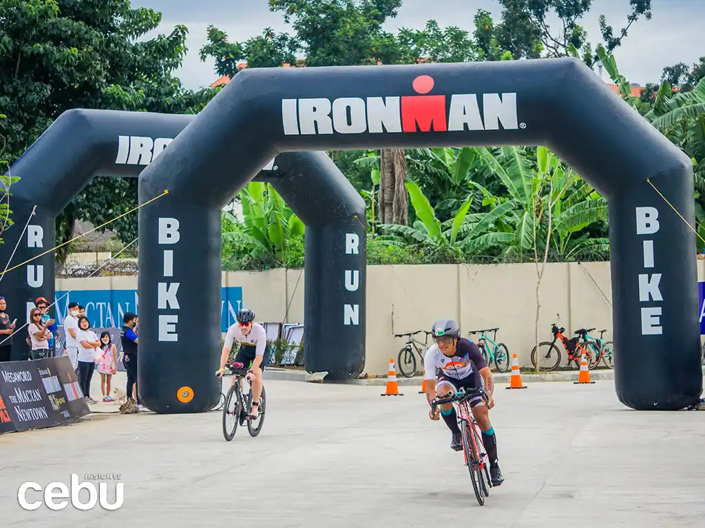 Two bikers enter the race for the Ironman sports event