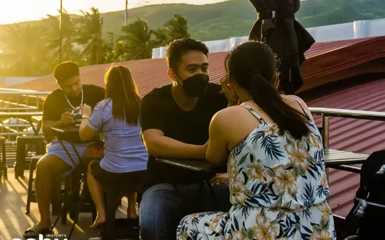 locals chatting in the Cebuano language