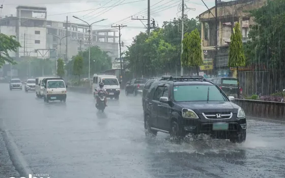 Cars travel despite rainfall amidst the rainy season in Cebu